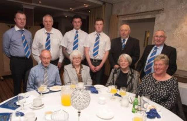 ALL SMILES. Alan Robinson and company, who were pictured at the Ballymoney Rising Star's dinner to celebrate their Centenary Year.INBM49-13 018SC.