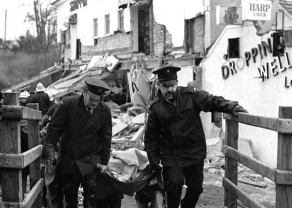 PACEMAKER PRESS INTL. BELFAST.  Ballykelly Disco bombing at Droppin Well Pub (INLA Bombing) 17 people died (mostly troops from the Cheshire Regt. who were with their wives and girlfriends