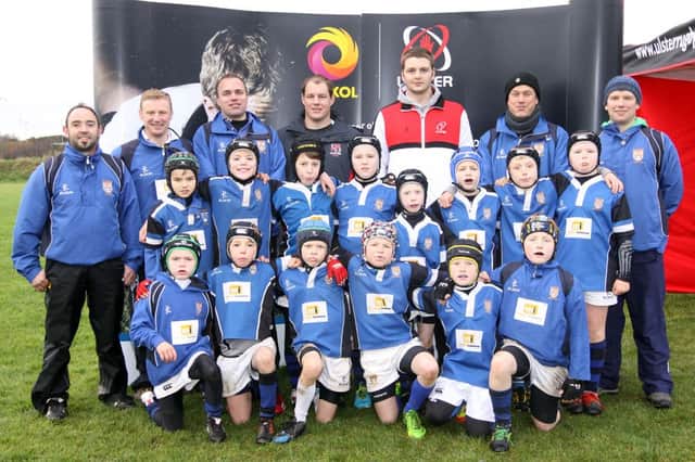 Ulster players Bronson Ross and Ian Henderson pictured with representatives from sponsors Maxol and the players and coaches from the Coleraine squad who took part in the Ulster Rugby Mini festival at Limavady Rugby club on Saturday.