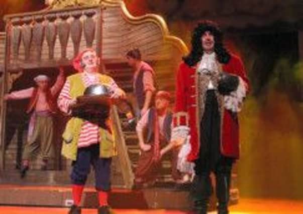 A scene from Peter Pan at the Millennium Forum featuring local actor Hugh McLaughlin (seated) along with William Caulfield (Captain Hook) and Gerard McCabe (Smee). INBM50-13