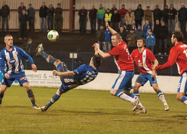 Eoin Bradley equalises for Coleraine with a spectacular overhead kick. Photograph by Derek Simpson