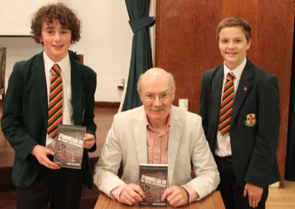 Friends pupils Chris Kane and Michael Foreman, along with the well- known Irish author Brian Gallagher. He visited school recently to speak about his new novel Stormclouds.