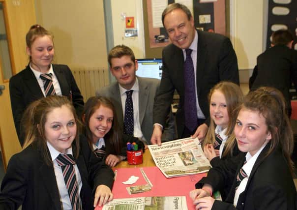 Nigel Dodds MP and Councillor Phillip Brett with Chloe McGurk, Shannon Connelly, Reanna Fleck, Katie McCullough and Jessica McConnell. INNT 50-027-FP