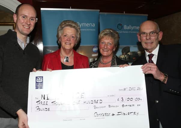 Vice-president of the Ballymena Chamber of Commerce & Industry Alan Stewart (left) and committee member Chris Wales present a cheque for £3100 to Samina Bonar and Heather Montgomery of Northern Ireland Hospice Ballymena Support Group.
