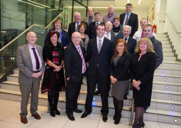 Environment Minister Mark H Durkan pictured with the Mid and East Antrim Statutory Transition Committee (STC) at the Braid last week.