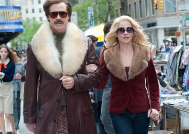 Undated Film Still Handout from Anchorman 2: The Legend Continues. Pictured (l-r): WILL FERRELL as Ron Burgundy and CHRISTINA APPLEGATE as Veronica Corningstone. See PA Feature FILM Ferrell. Picture credit should read: PA Photo/Paramount Pictures Corporation. WARNING: This picture must only be used to accompany PA Feature FILM Ferrell.