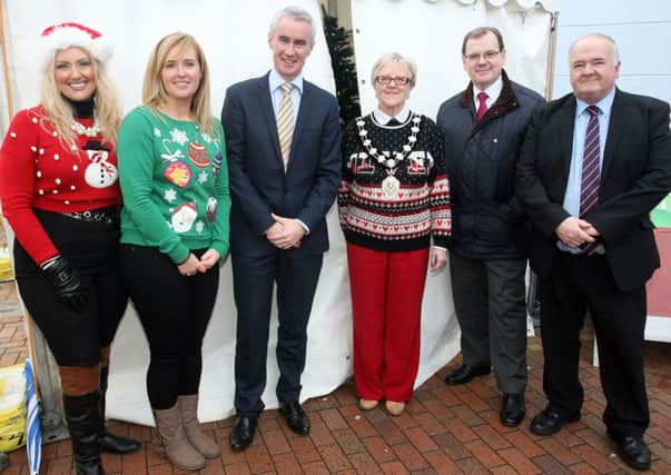 Mayor of Ballymena, Cllr. Audrey Wales, who officially opened the Ballymena Christmas Market, is pictured along with Anne Simpson, Grace Gillen, Terry Robb, Thomas McKillen (Chairman Chamber of Commerce) and Ald. Martin Clarke. INBT51-230AC