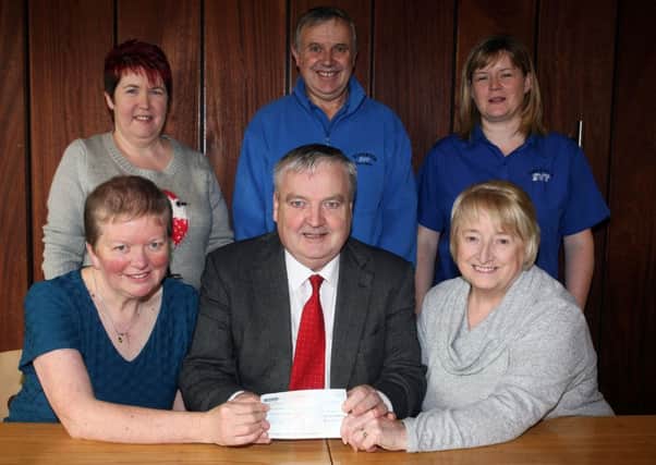 Colm Best of  the Dunclug Partnership presents a cheque for £2100 to Major Elizabeth Pritchard (left) of the Salvation Army and Margaret Dempster President of St. Vincent De Paul, raised from the recent gospel concert held in All Saints Church. Included are Doreen Armstrong (shop manager Salvation Army), John McCloskey (assistant manager SVDP) and Mary Dempster (manager SVDP). INBT51-223AC