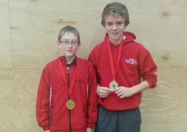 Kyle Magee (left) and Oliver Standsfield with their Gold Medals, which they won at the weekend.