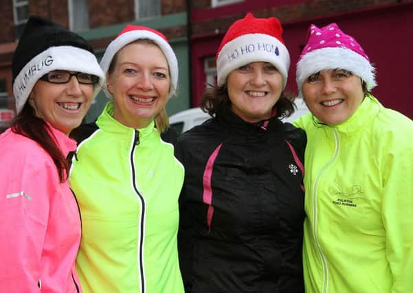 Runners Beverley Gillen, Julie Baldrick, Janette Burns and Sharon Miller,  taking part in the Christmas 5K Park Run, from the Council Offices on Saturday morning. INLS 5113-549MT.