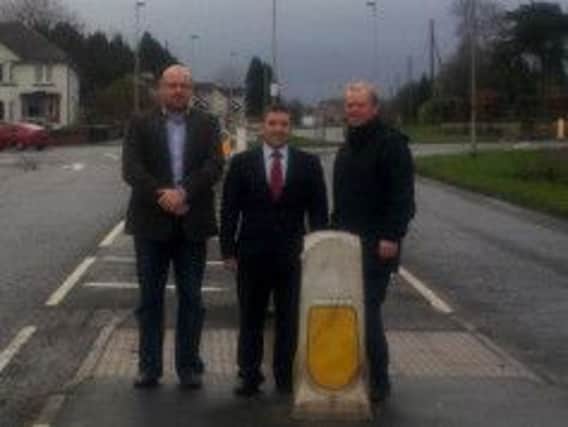UUP representatives Darryl Wilson, Robin Swann MLA, and Cllr Tom McKeown discuss the need for a school crossing patrol at Rodeing Foot in Ballymoney. INBM52-13