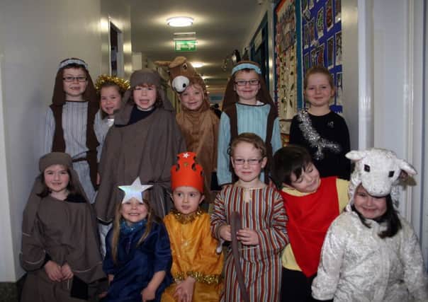 Children from P1 and P2 about to take the stage for the Christmas play at St Brigid's Primary School.INBM52-13 111F