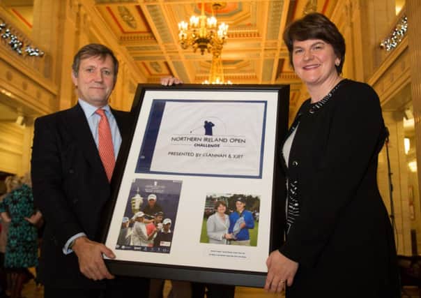 Christopher Brooke Galgorm Castle presented the Tourism Minister Arlene Foster with a presentation flag from the inaugural Northern Ireland Open Challenge held at Galgorm Castle Golf Club at the end of August 2013. This token of appreciation was to thank the Minister, all her staff and the Northern Ireland Tourist Board for their assistance and support in hosting Northern Irelands main Professional Golf Tournament. The presentation took place at Stormont Buildings.