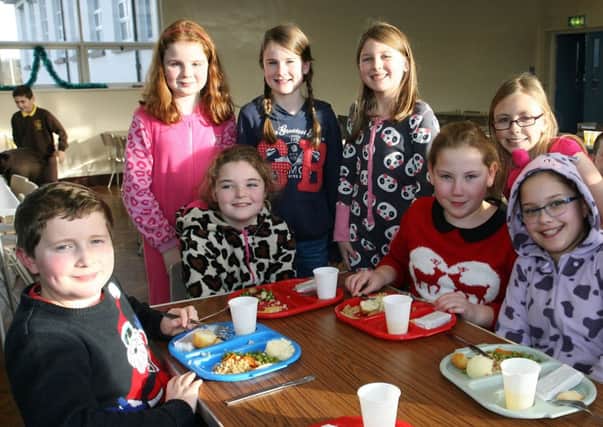 Pupils from the Buick Memorial PS who enjoyed their Christmas dinner last week. INBT52-226AC