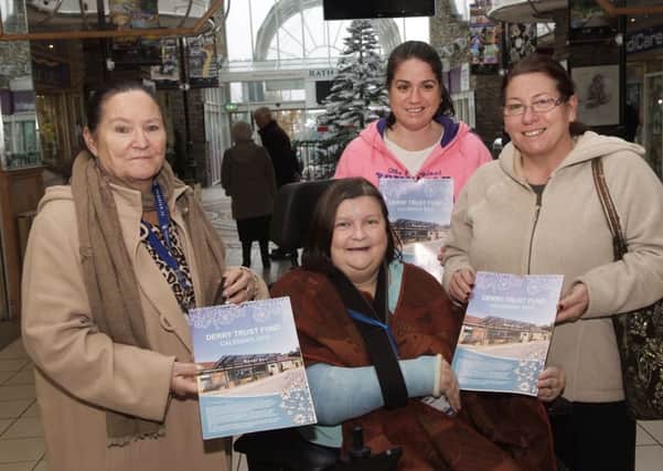 Members of the Derry Trust Fund, from left, Anna Dillon, Elizabeth Zammitt, Lisa Mcintyre and Elaine McIntyre who are selling copies of their 2014 callendar to raise funds to support patients of the Renal Unit at Altnagelvin Hospital. INLS4913-223KM