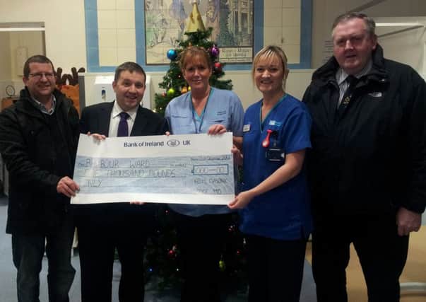 Members of Kells Masonic Lodge who presented to the Royal Childrens Hospitals Barbour Ward. They are: Stephen Craig, Treasurer; Robin Swann MLA, Worshipful Master; Staff Nurse Gillian, Sister Grace Hamilton, both Barbour Ward; Gardiner McCluney, Almoner.