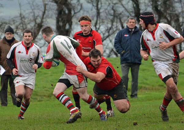 Larne RFC in action against Carrick in their Hawkins Cup game.
