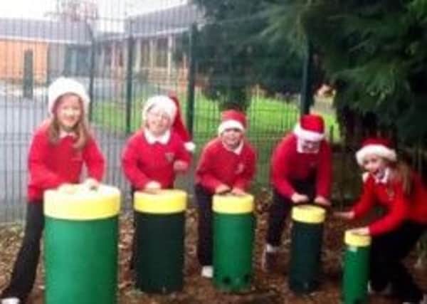 Drumahoe Primary School pupils ham it up for a Christmas video...