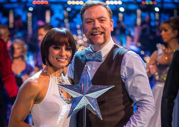 Flavia Cacace and Rufus Hound with heir trophy.