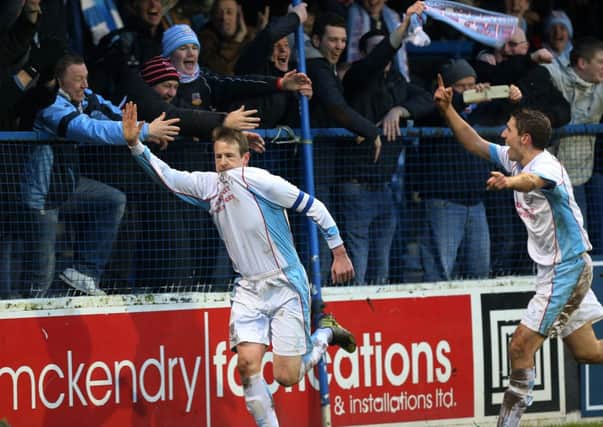 Allan Jenkins wheels away in celebration after putting Ballymena United 2-0 ahead at Coleraine. Picture: John McIlwaine.