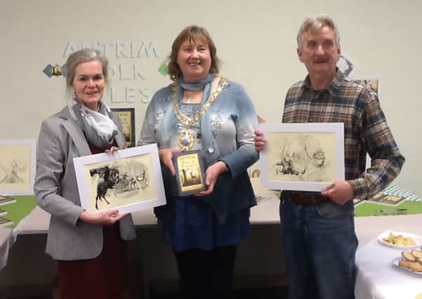 Authors of Antrim Folk Tales, Billy Teare and Kathleen O'Sullivan, pictured with Larne Mayor Maureen Morrow at the official launch event in Larne Library.  INLT 01-675-CON