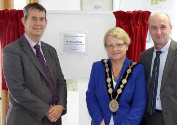 Pictured at the opening of the new Advanced Community Care office at Ballinderry Business Park are Health Minister Edwin Poots, who carried out the official opening, with Lisburn Mayor Margaret Tolerton and Nial Smith, director at Advanced Community Care. US1327-539cd