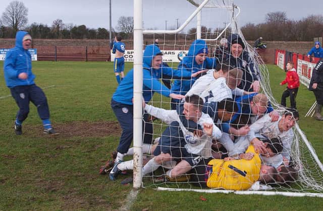 Mayhem and madness as Coleraine Reserves win the cup.