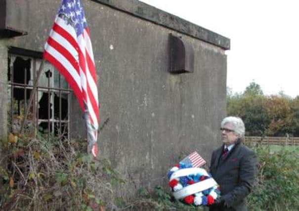 Ballymena man James G Brown lays a wreath on the 70th Anniversary of American Troops being stationed at Toome Aerodrome N. Ireland during World War Two.