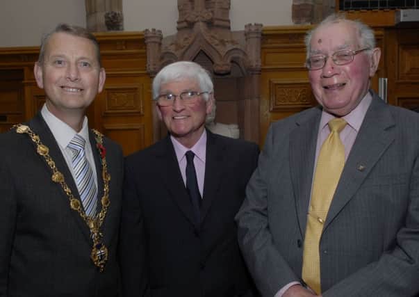 The then Mayor, Alderman Maurice Devenney pictured with Jobby Crossan and Joe Grimes at the reception held in the Guildhall to celebrate the 125th anniversary of the North West Football Association. INLS4611-119KM