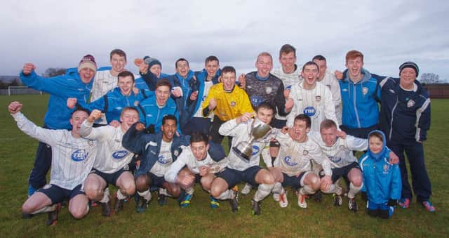 Coleraine Reserves celebrate after winning the Craig Memorial Cup following their penalty shoot-out victory over Moyola Park on Saturday.
