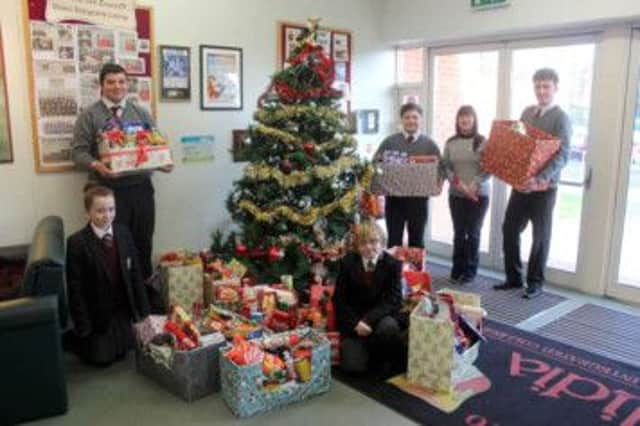 Ulidia Intergrated College pupils helping with the annual hamper appeal. INCT 01-759-CON