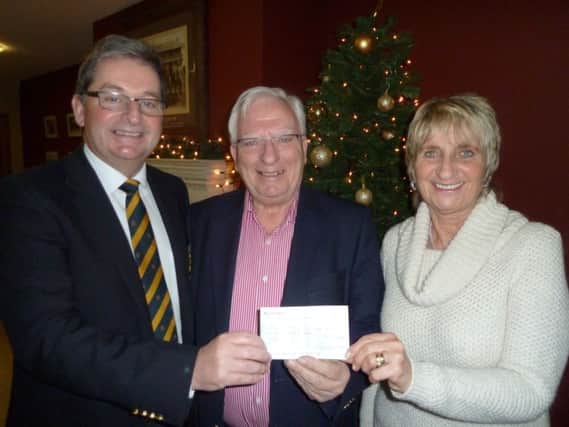 Club Captains Malcolm Glover and Mo Giffin recently presented a cheque on behalf of Portstewart Golf Club to Edward McAuley, a representative from the Causeway Alzheimers' Society Awareness Group. The money raised was the result of golfers being penalised £1.00 each time they were in a Charity bunker, either on the Strand or Riverside Course. Many thanks to members for participating in this fundraising.