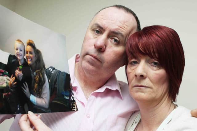 John and Jenny Mc Garvey, with the last picture of their beloved daughter Kelly  which was taken on Christmas Day with her nephew Johnny.PICTURE MARK JAMIESON.