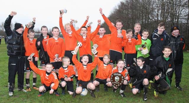 Lisburn Youth celebrate after beating Annagh Utd 4-1 in the under-14 Lisburn Junior Invitational League finals. US1402-518cd Pic: Cliff Donaldson