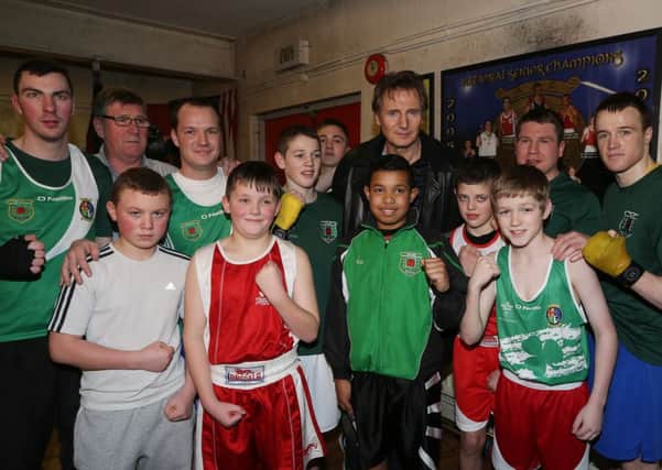 Liam Neeson with All Saints Boxing Club official and club members who have won Ulster boxing titles in recent years. Included are Vinny Esler, Matt Hamill, Dermot Hamill, Reece McDonnell, Joel Scullion, TJ Hamill and Steven Donnelly
Front row L-R
Odhran Ward, Sam McCullagh, Emeka Onwuka, Tyler McMullan, Oisin Doherty.