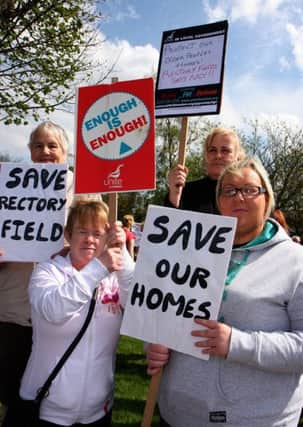 Staff and friends protest outside the Rectory Field Nursing home  on the Limavady Road. INLS 1319-533MT.