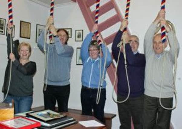 Ringing in the New Year are Wendy Gardiner, Denis Johnston, Jill Castles, William Dumigan and Leslie Wylie.