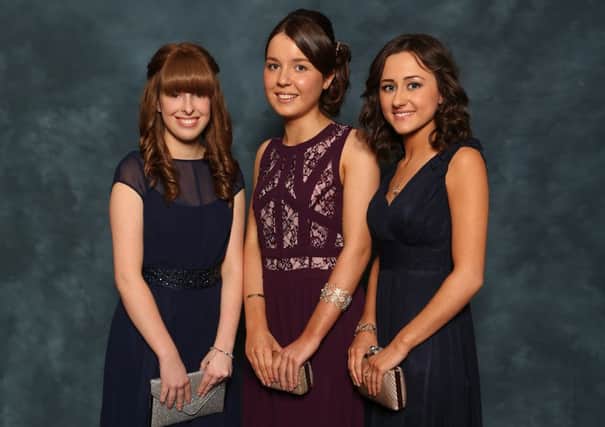Rebecca Long, Hayley Sloan and Naomi McClintock at the Cambridge House Grammar School formal.