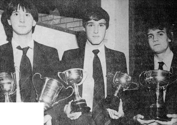 1981 - Prizewinners at Cambridge House Boys' School. From left: David O'Kane, David Brown and Keith Wood. INBT47-751F