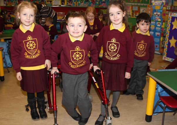 Little 5-year old Oliver Dickey, with his class friends at Millburn Primary School in Coleraine.PICTURE MARK JAMIESON