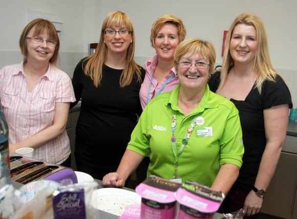 BIG HEARTS. Pictured at a Big Hearty Breakfast held in aid of the British Heart Foundation at Coleraine Council Headquarters on Wednesday are Tracey Freeman, Debbie Blair, Jennifer Houston and Alexis Bloomfield along with ASDA Community Champion, Sheila Palmer, who provided the hehalthy food on offer.CR3-100SC.