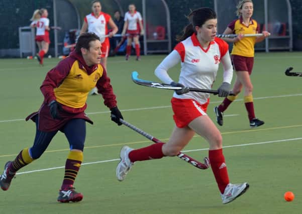 Action from Larne Ladies III's win over Mossley Ladies III at Greenland.