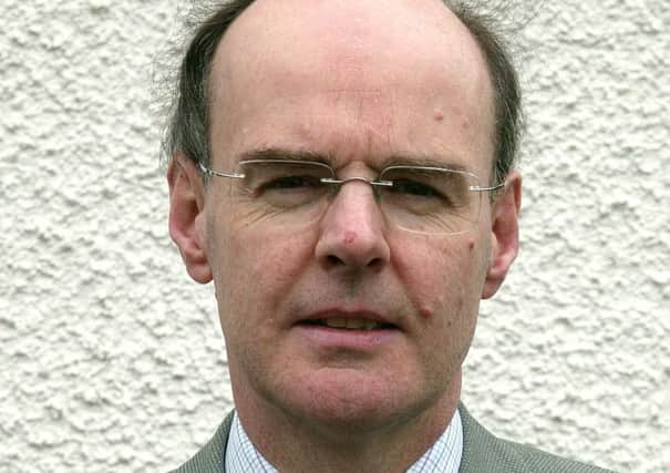 Councillor Declan O'Loan