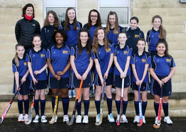 The Slemish College U-13 team who are playing Lagan College in the semi-finals of the NI Integrated Hockey Cup. Included is coach Mrs. D. Ross.  INBT03-208AC