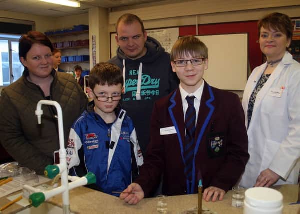 Heather Millar, head of Chemistry at Dalriada with Brandon Patterson and Eddie, Karen and Kyle Pollock at Dalriada Open morning.INBM04-22-14 101F
