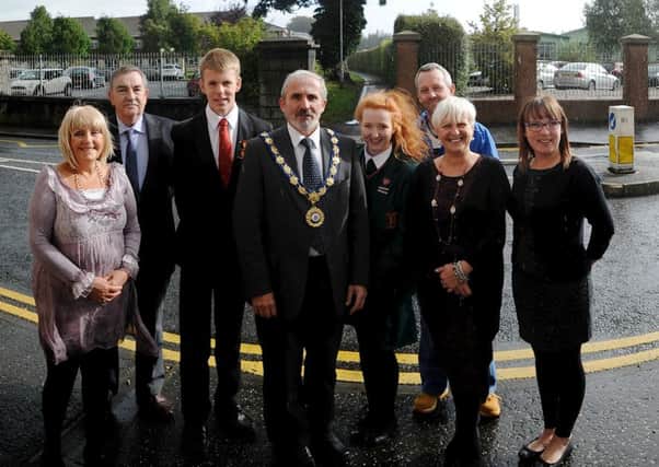 The Mayor o Limavady, Gerry Mullan pictured at the launch of a plan for a footbridge between Limavady HIgh School and St Mary's. Included, are Addis Blaine Limavady Singers, Sean Bradley, Limavady Wolfhounds, Mathew Lennox, Eimear Duffy, Ian McMullan, Limavady youths, Diane Rathfield and Joanne Palmer. DER3913SL009