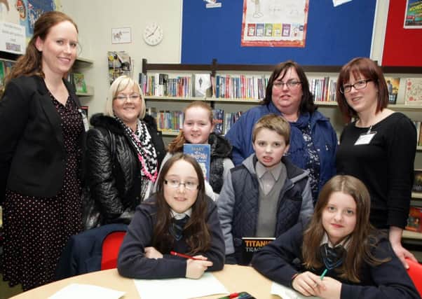 QUIET PLEASE. Pictured in the Library on Monday night along with Teachers Joy Gamble and Tracy Montgomery and pupils Carly and Odessa are Mums Deirdre McAuley and Terri Sharp with their respective daughter and son Jenna and Dylan.INBM4-14 003SC.