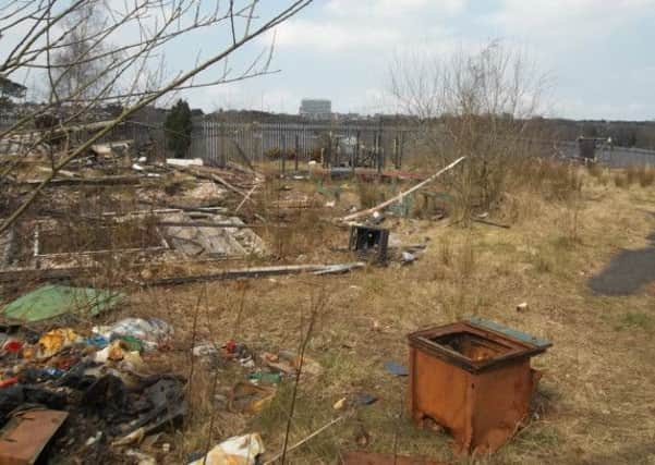 Domestic rubbish and waste on the derelict site at Tullyally.