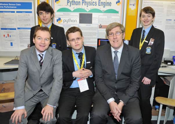 Local young scientists showcase their talents in Dublin

Education Minister, John ODowd, pictured with (left) Mark Crawford, Robert Clarke and (right) Matthew Sullivan from St Louis Grammar, Ballymena and Peter Morris, BT Ireland as he viewed the BT Young Scientist and Technology Exhibition 2014 in Dublin.

The Minister today toured the event, held at the RDS, and met with pupils to view displays of their work. Across the 16 local schools represented, a total of 28 individual projects have made it to the finals. Picture: Michael Cooper