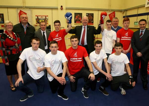 Local boxers along with Mayor of Ballymena, Cllr. Audrey Wales, Robert Montgomery (Unite), Paul McMahon (Ulster Boxing), Lee Gallagher (Unite), Jimmy Kelly (Unite) and Paul Frew MLA at the launch of the 2014 Ulster Elite Boxing Championships. INBT04-207AC